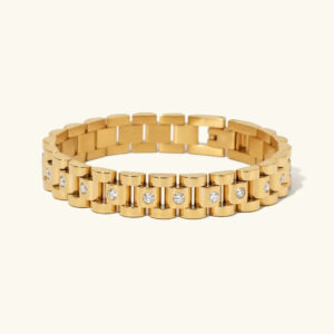 18K gold link chain bracelet with diamond studs flat lay top view showing polished gold links and sparkling cubic zirconia stones