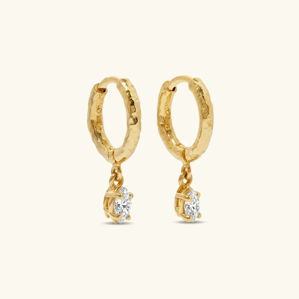 18K gold hammered diamond drop hoop earrings flat lay front view showcasing textured gold hoops with sparkling cubic zirconia marquise pendants