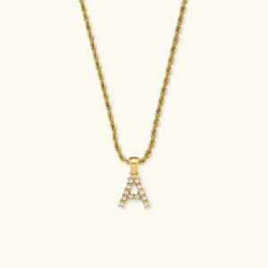 18K gold initial A pearl pendant necklace with twisted chain front view flat lay