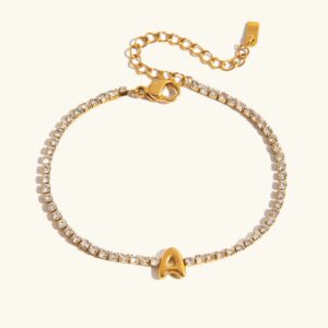 18K gold bubble letter A tennis bracelet with diamond simulants, flat lay top-down view on white background