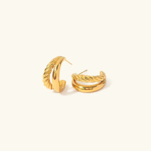 18K gold twisted layered hoop earrings front view flat lay dual texture design
