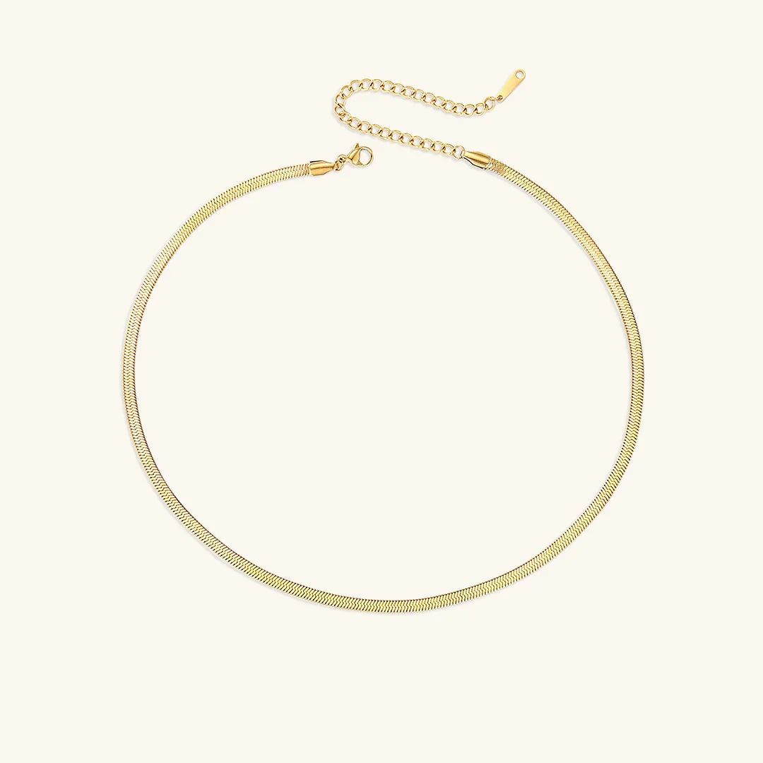 18K gold herringbone necklace 3mm width showing medium chain thickness with intricate V-pattern weave
