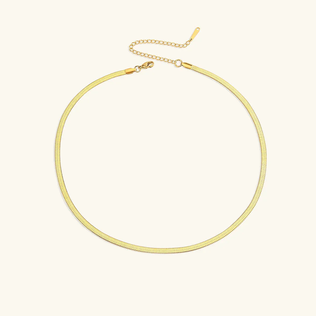 18K gold herringbone necklace 4mm width premium chain demonstrating bold elegant design and craftsmanship