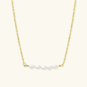 18K gold freshwater pearl necklace with baroque cluster pendant, front flat lay view on neutral background showing polished gold cable chain and white pearl details