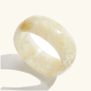 Chunky cream marbled acrylic bangle bracelet front view studio flat lay