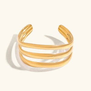 18K gold triple layer open cuff bangle front flat lay view polished finish three parallel bands