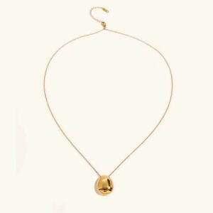 18K gold dome pendant necklace flat lay front view on white background with polished pendant and delicate gold chain