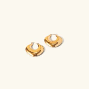 18K gold geometric hoop earrings with sculptural spade-circle design, polished finish on plain background