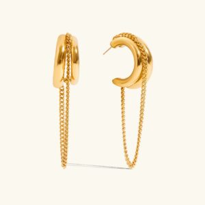 18K gold layered chain drop hoop earrings front flat lay view on light beige background showing sculptural double-curve design with delicate chain tassels