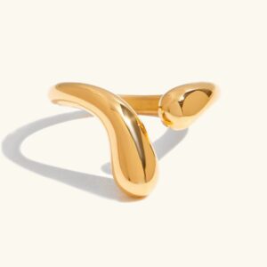 18K gold twisted open ring with polished teardrop ends flat lay studio view minimalist band