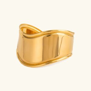 18K gold smooth sculptural cuff bracelet with polished wavy edge on plain white background front view