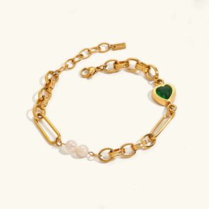 18K gold emerald pearl bracelet mixed link design flat lay top view