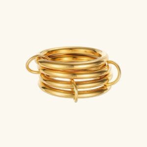18K gold and sterling silver two-tone stacked ring front flat lay view polished metal bands minimalist design