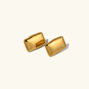 18K gold irregular rectangle stud earrings flat lay overhead view with polished finish on off-white background