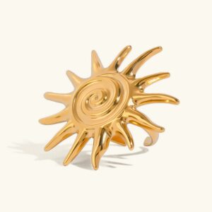 18K gold solstice sun ring with spiral ray design front view flat lay white background
