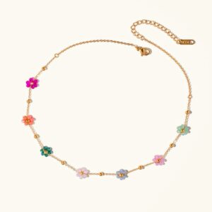 18K gold azalea floral necklace flat lay featuring multicolor pastel flower charms with delicate gold beaded chain and polished finish