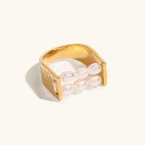 Elliana dual-row freshwater pearl ring in 18K gold PVD, flat lay product shot on neutral background