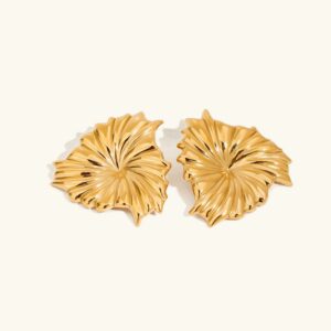 18K gold sculpted petal stud earrings with radial-ribbed leaf texture, top-down flat lay on white background, premium polished finish