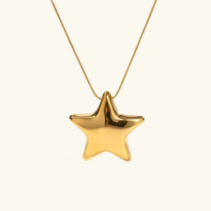 18K gold star pendant necklace front view flat lay, delicate glossy golden star with thin chain on plain light background