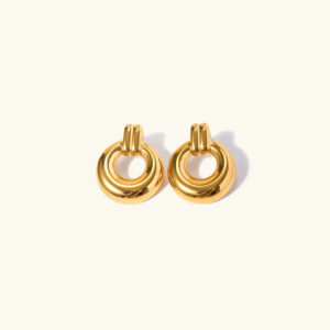 18K gold knotted hoop earrings flat lay on plain background showing detailed hollow circular knot design polished finish
