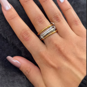 18K Yellow Gold Diamond Stack Rings on Hand - Close-Up Side View Demonstrating Perfect Fit and Sparkle on Female Model