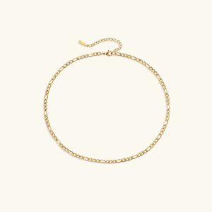Figaro gold chain necklace 4mm width flat lay with lobster clasp and extender chain on light background