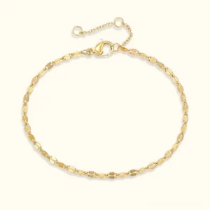 14K gold plated lace chain bracelet with flat oval links on light background, adjustable design with extension tail clasp