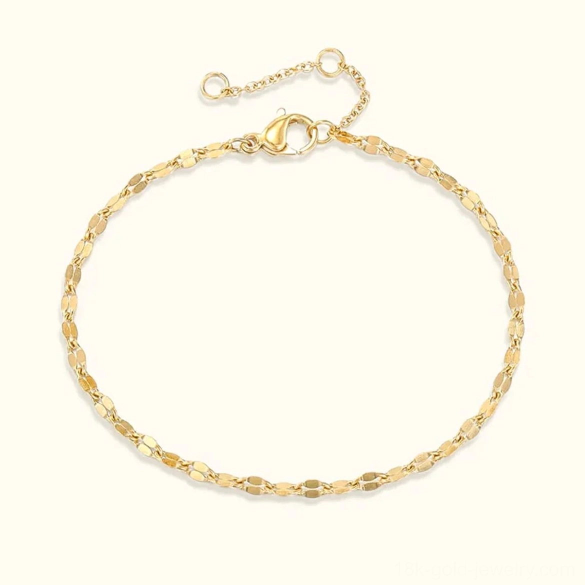 14K gold plated lace chain bracelet with flat oval links on light background, adjustable design with extension tail clasp