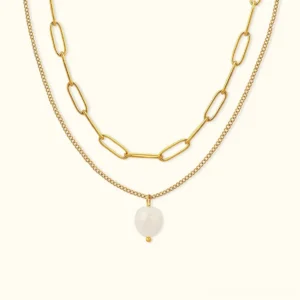 14K gold layered freshwater pearl necklace with dual chain design and teardrop pearl pendant flat lay view