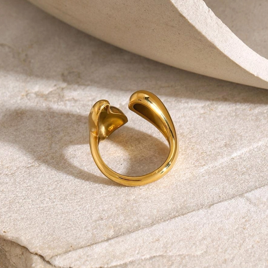 18K gold abstract minimalist open band ring with simple curved design, polished finish side view