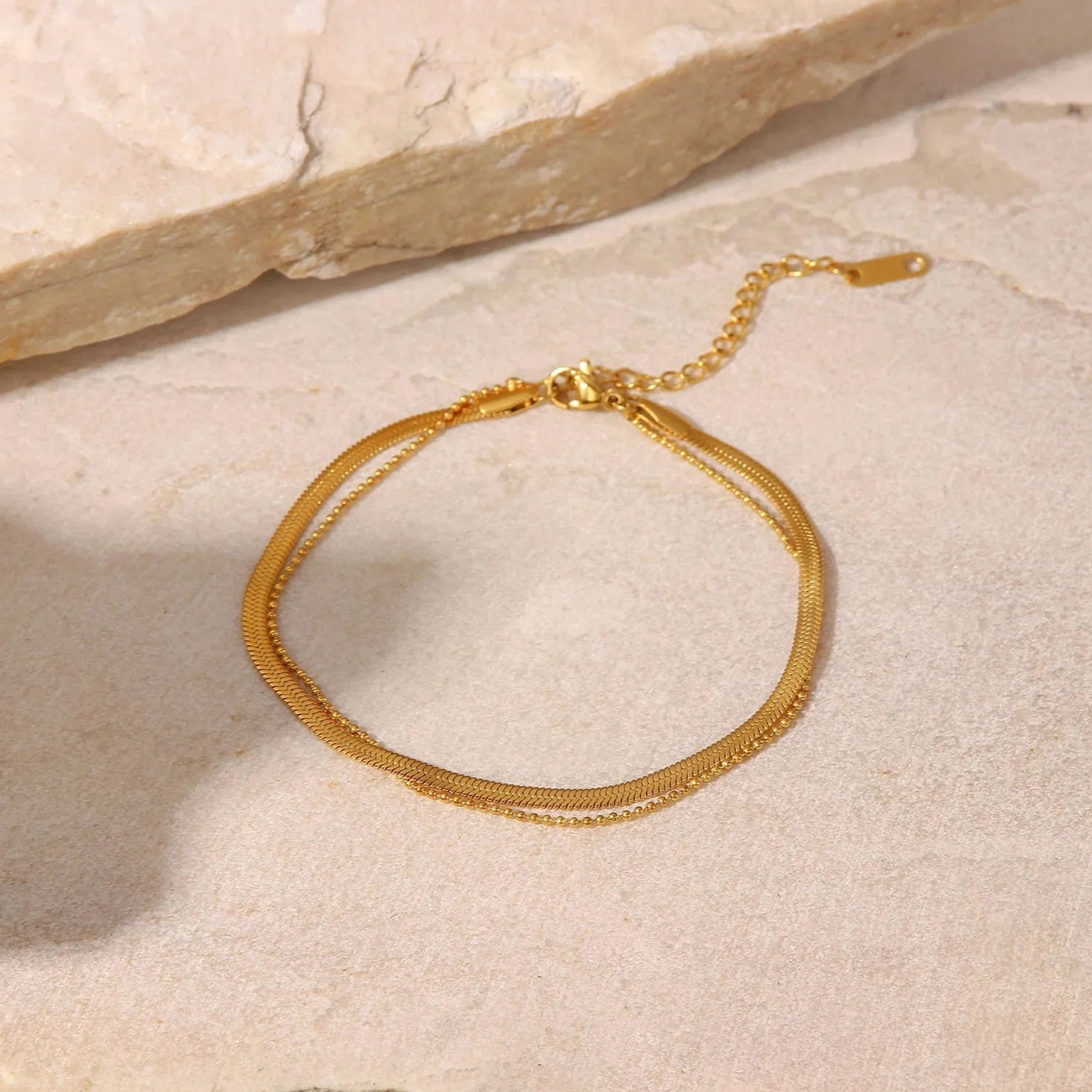 18K gold anklet flat lay beige stone - adjustable extender clasp design elegant