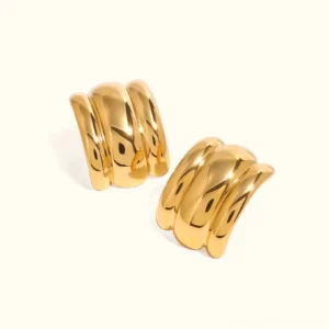 18K gold arch stud earrings flat lay - triple curved design with polished smooth gold finish on white background