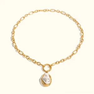 18K gold baroque pearl pendant necklace front view flat lay on light background showing wire-wrapped natural pearl and polished gold chain