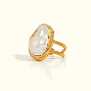 18K gold baroque pearl statement ring frontal close-up with twisted gold band and irregular white pearl on white background