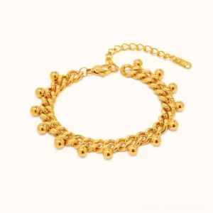 18K gold beaded chain bracelet flat lay overhead view showing full curb chain design with spherical beads and adjustable extender chain on white background