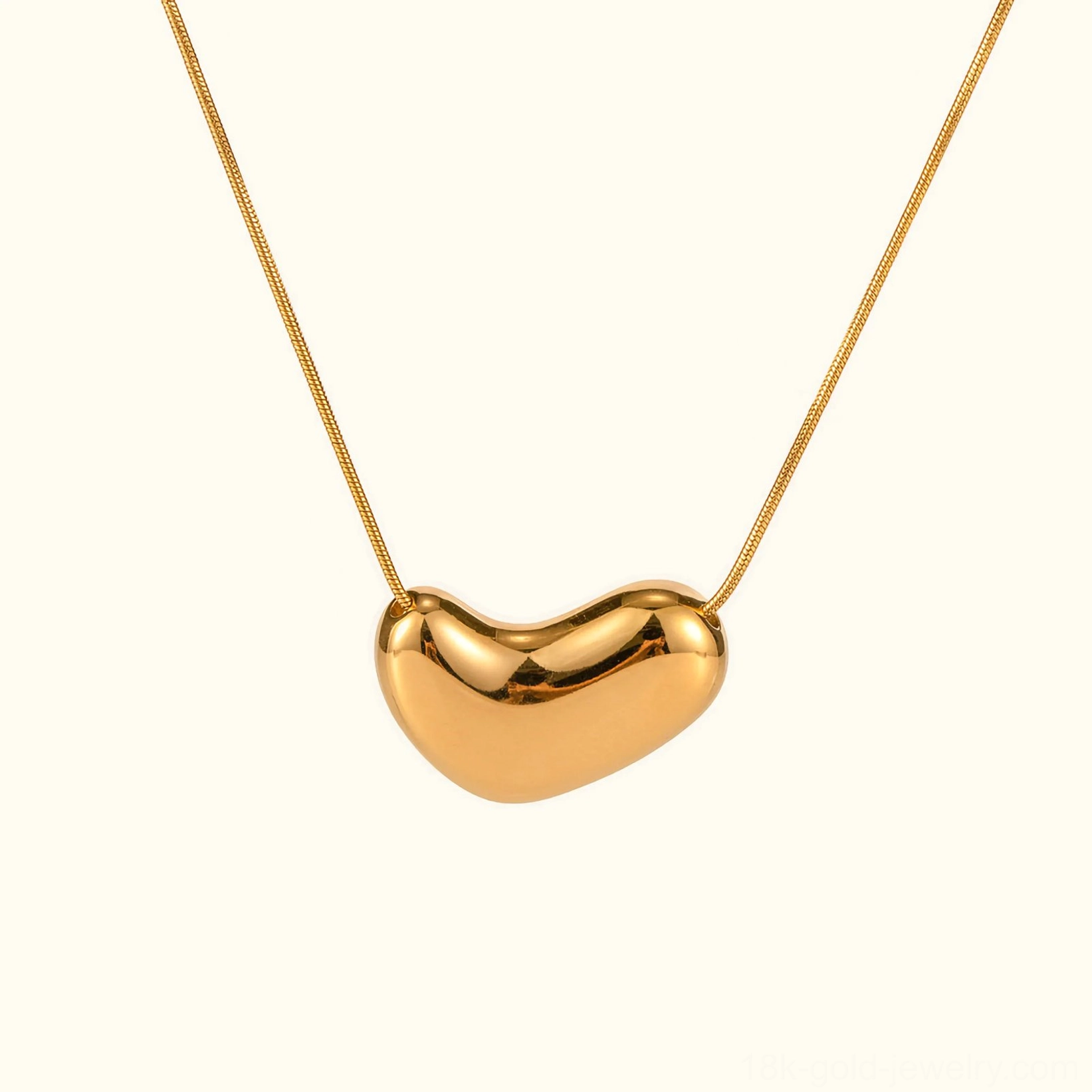 18K gold bean pendant necklace front flat lay view polished finish delicate snake chain
