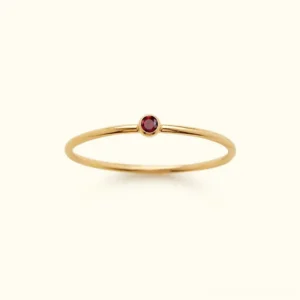 18K gold birthstone stacker ring with red garnet gemstone bezel setting front view