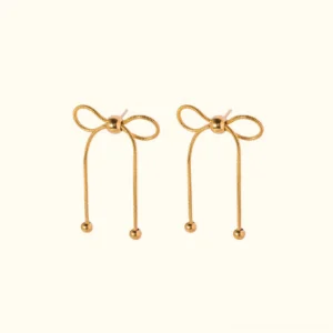 18K gold bow drop earrings flat lay front view with chain and ball pendant design