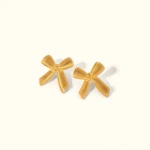 18K gold bow stud earrings front view flat lay, chunky ribbon design with high-polish finish on plain background