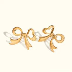 18K gold bow stud earrings front view flat lay - polished ribbon bow design with smooth gold finish on white background
