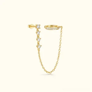 18K gold chain cuff earring flat lay front view showcasing dual stud and cuff design with cubic zirconia accents on neutral background