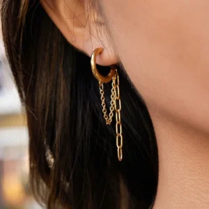 18K gold chain hoop earrings worn on ear side profile long hair model styling