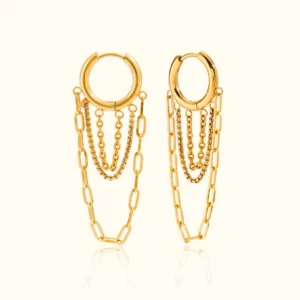 18K gold layered chain huggie hoop earrings flat lay front view on light background showing polished finish and mixed chain tassels design