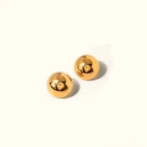 18K gold chunky ball stud earrings flat lay top-down view showing polished spherical design on neutral background