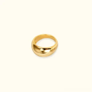 18K gold chunky band ring flat lay top-down view polished smooth curved golden band