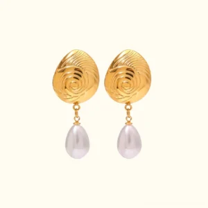 18K gold conch shell pearl drop earrings front view on plain background, polished spiral stud with white teardrop freshwater pearl