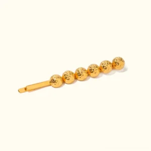 18K gold coral beads french hair pin flat lay front view with textured round beads on white background