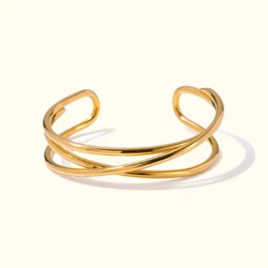 18K gold crisscross cuff bracelet with twisted overlapping bands on neutral background, front static top-down view showcasing polished gold texture and open design
