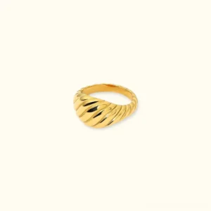 18K gold croissant ring with twisted ridged dome band flat lay frontal view