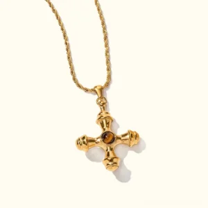 18k gold cross pendant necklace with twisted rope chain flat lay front view plain background
